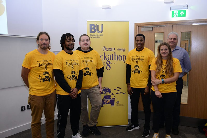 Ocean Hackathon winning team at Bournemouth University 2023, pictured with BU Chief Operating Officer, Jim Andrews