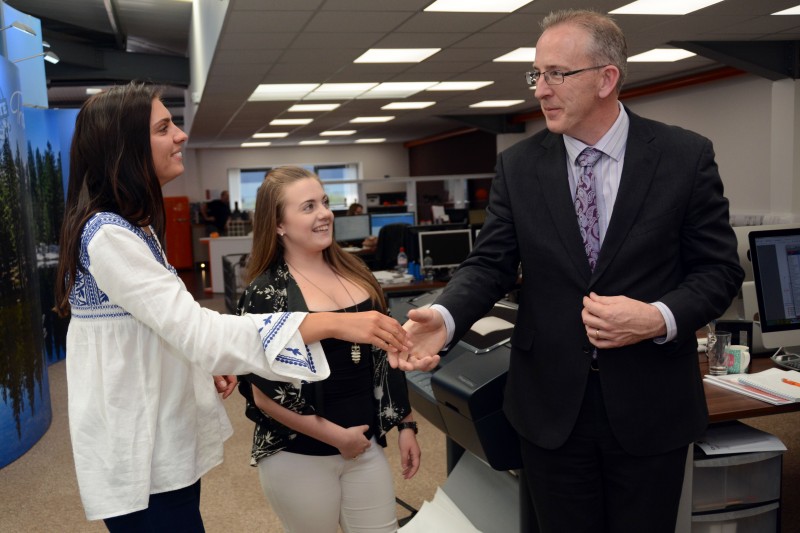 Professor John Vinney meeting BU graduates at Quadrant2Design