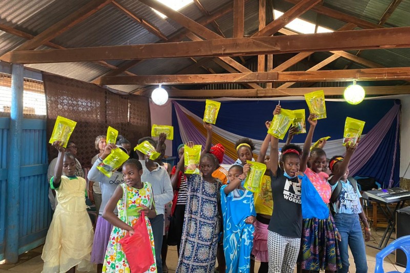 A group of girls who have worked with Ruth