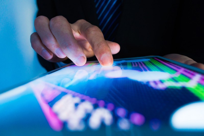 Person using touchscreen Person using touchscreen