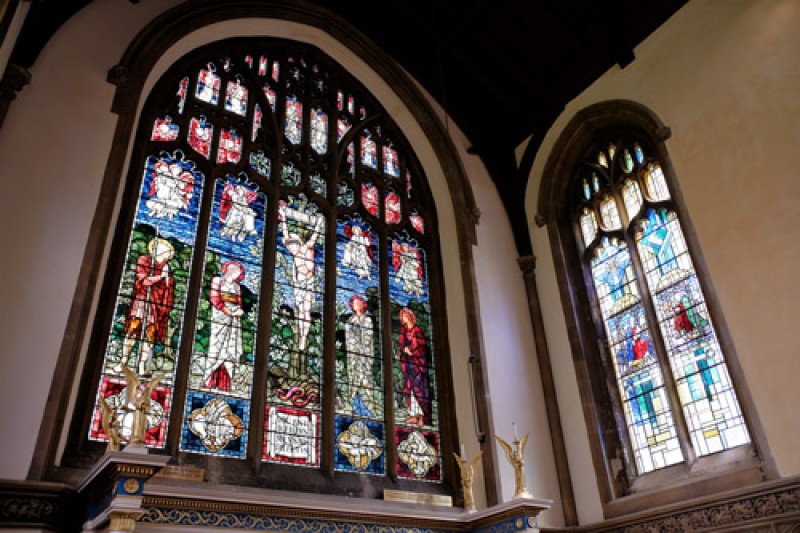 Two stained glass windows in a church
