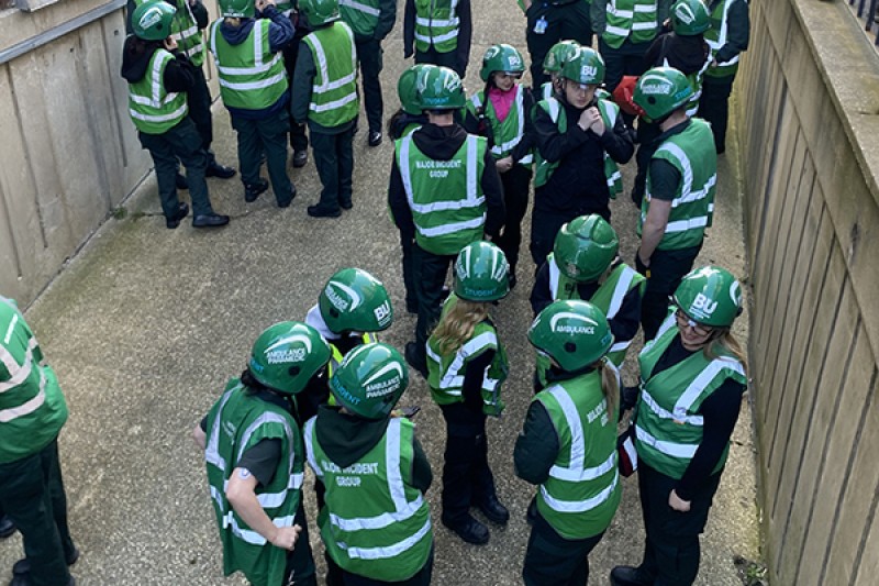 Paramedic students being led into the underground car park