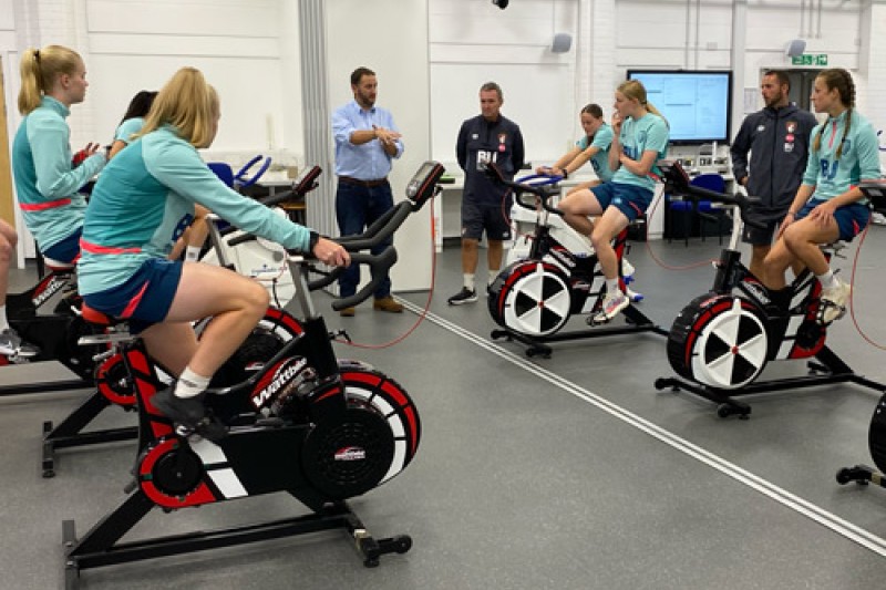 AFCB Women's team players warming up before fitness testing