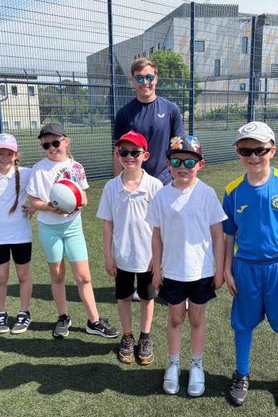 David Howells introducing VI cricket to the visiting children