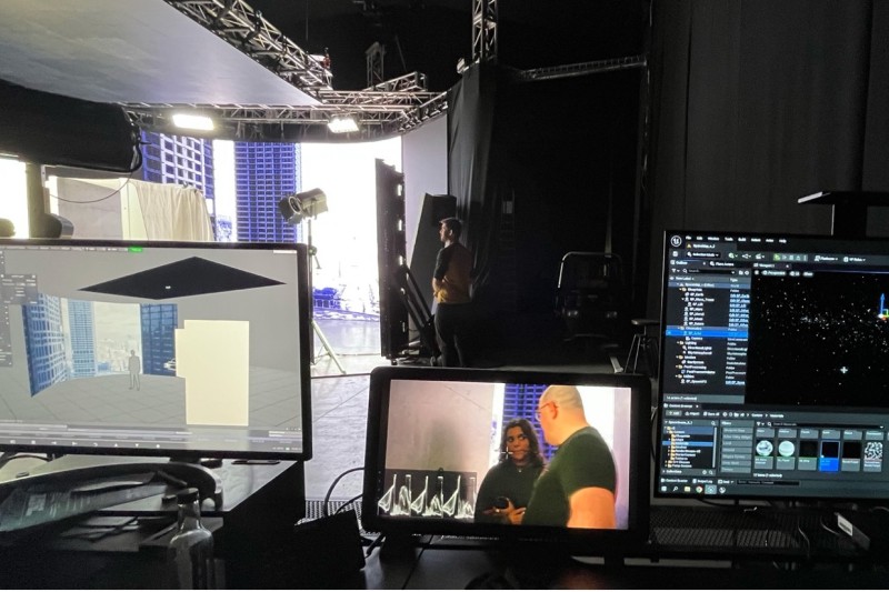 Computer screens in a virtual production studio