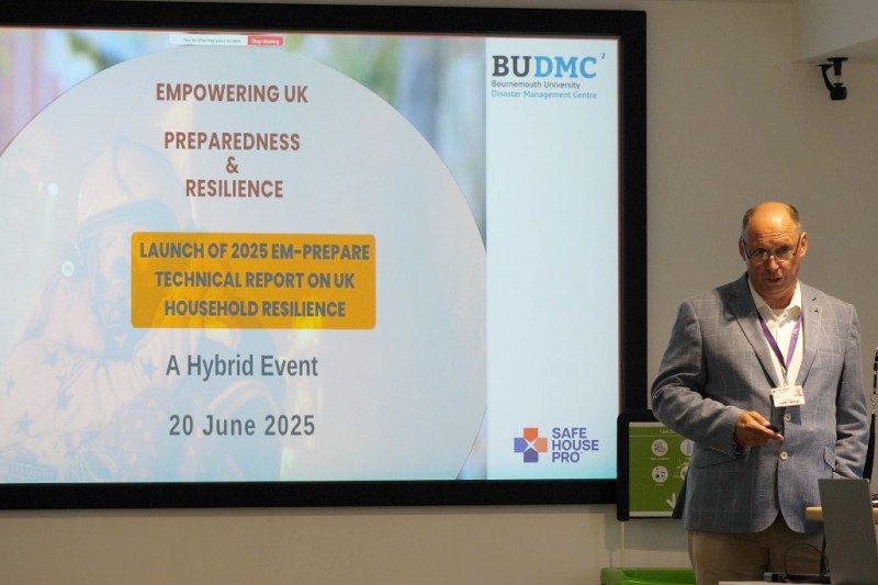 Professor Miles giving a presentation on the report