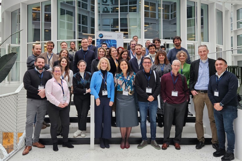 The ARTEMIs project consortium group gathered in front of a building