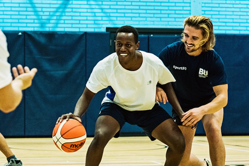 Image of people playing basket ball