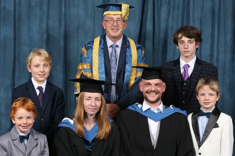 Kirsty and Ian Young with their family at Graduation 2023
