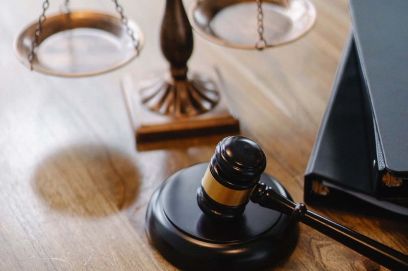 Scales and a gavel on a desk 