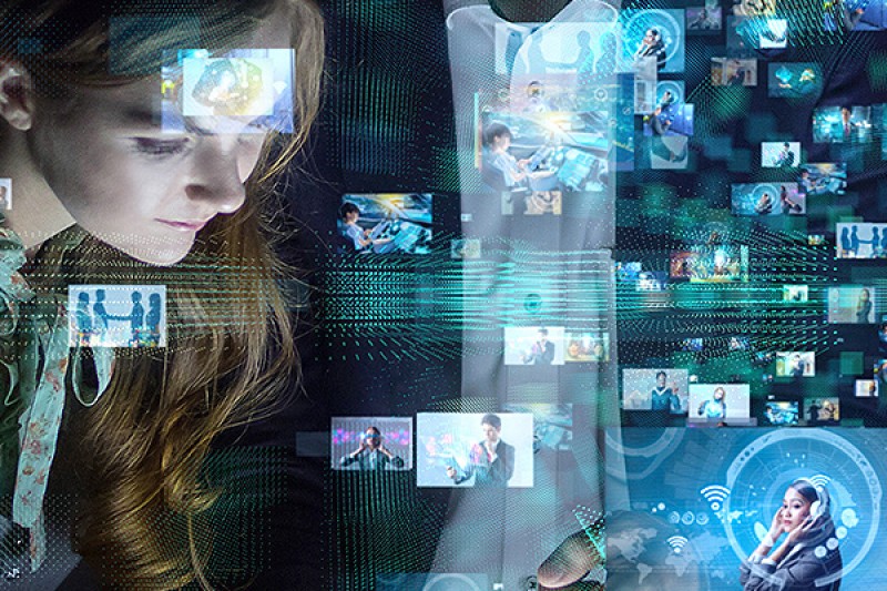 Group of people watching many pictures Image of a group of people watching many pictures