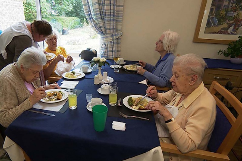 Patients eating in a care home
