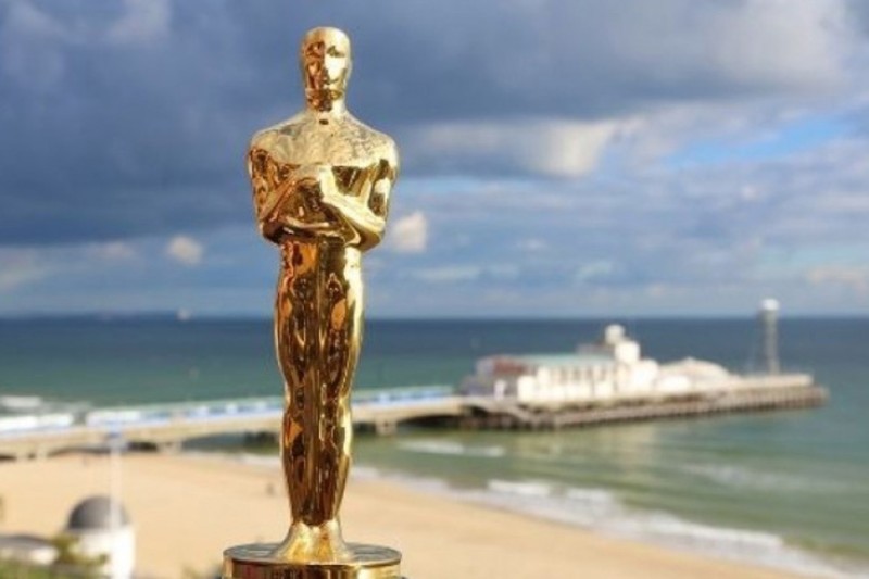 Image of an Oscar and Bournemouth pier An Oscar and Bournemouth pier