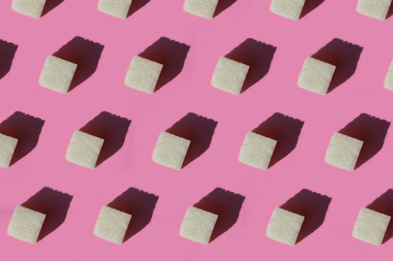 Sugar cubes on a pink background Sugar cubes on a pink background