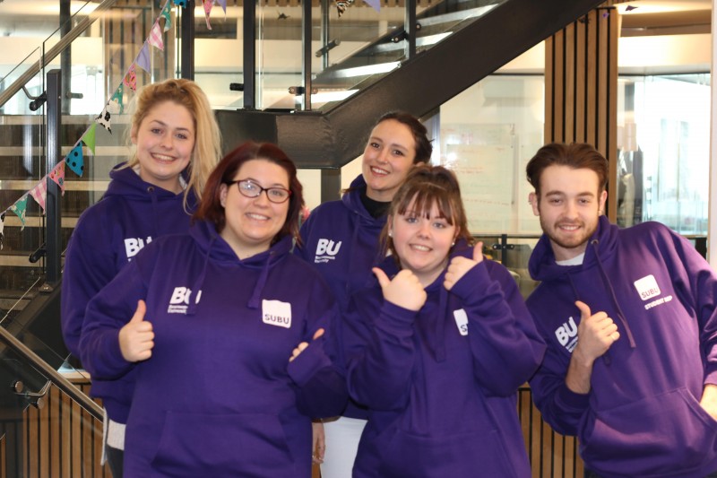 Group iof SUBU Student Reps in purple hoodies
