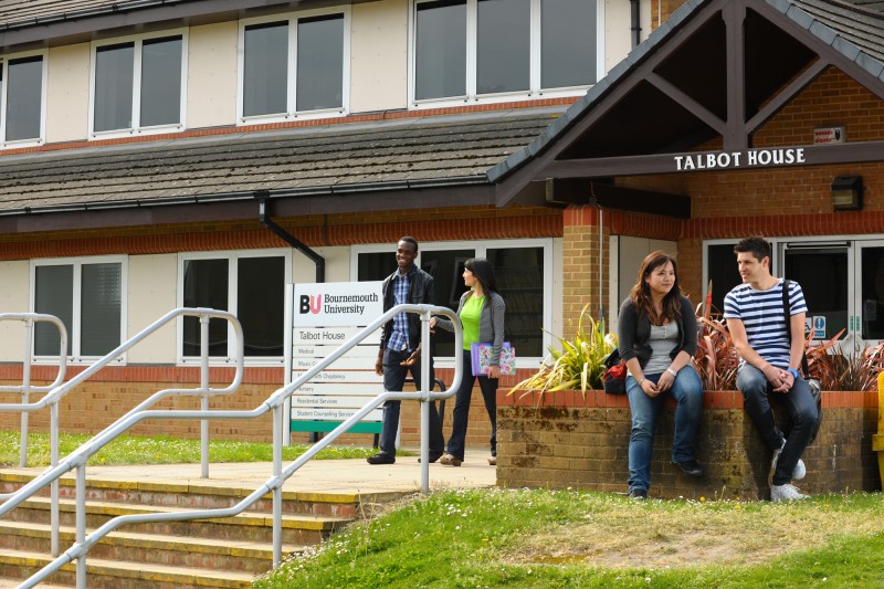 students talbot house wellbeing health students sitting outside talbot house