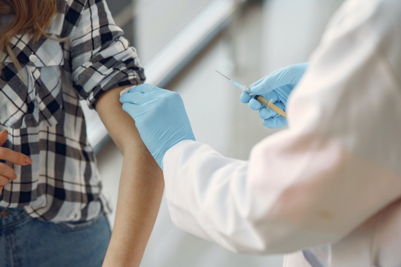 Person being vaccinated Person being vaccinated